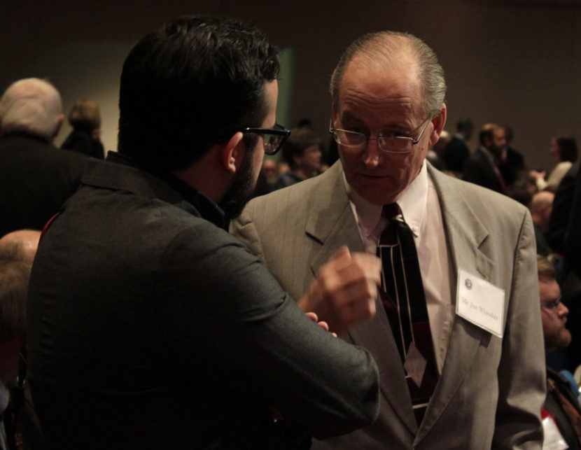 Fairbanks Daily News-Miner reporter Matt Buxton speaks to Jim Whitaker, chief of staff for Alaska Gov. Bill Walker, shortly before Walker's inauguration Monday, Dec. 1, 2014 in Juneau, Alaska's Centennial Hall.
