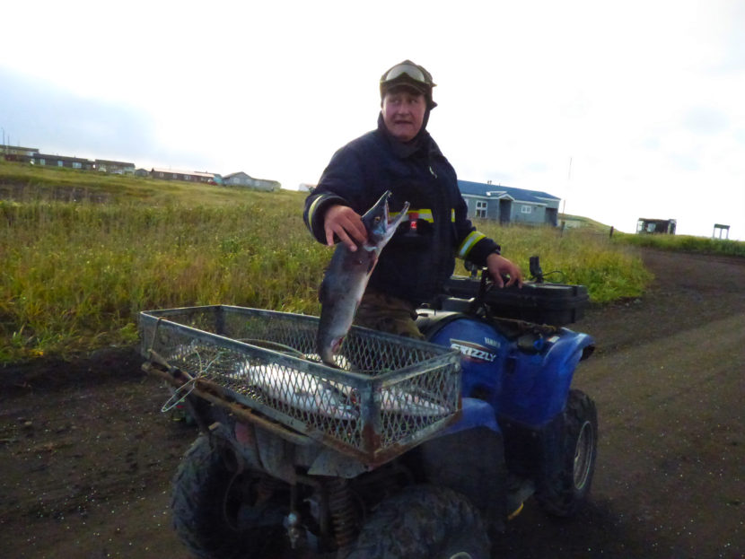 Diodor Stepetin shows off the salmon he caught in St. Paul's lagoon. (Courtesy Lauren Divine)