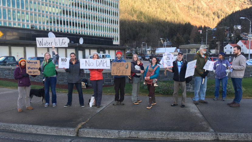 Locals in Juneau protest the Dakota Access Pipeline project outside the offices of U.S. Sens. Lisa Murkowski and Dan Sullivan, Nov. 15, 2016. (Photo courtesy Larry West)