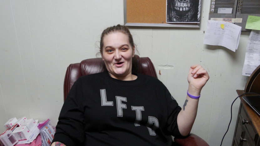 Brianna McCourt works the front desk at the Bergmann Hotel. Friday, Nov. 4. (Photo by Quinton Chandler/KTOO)