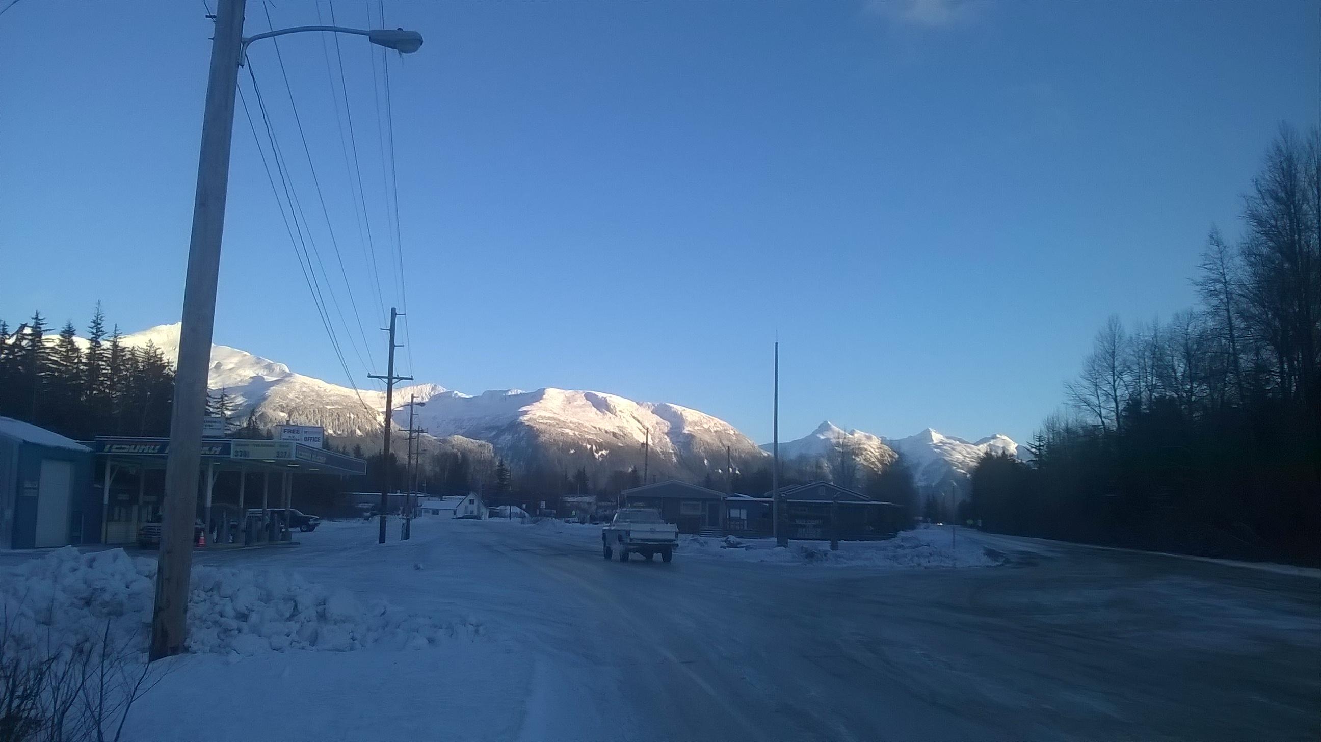 Department of Transportation workers cleared away slush on Sunday morning, but icy conditions persist because state workers wanted to avoid using too much overtime. (Photo by Emily Files/KHNS)