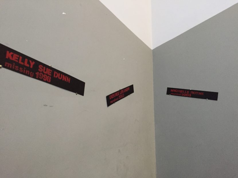 Names of victims adorned the walls at a commemoration of the Day to End Violence Against Sex Workers on Dec. 17, 2016 in Anchorage. (Photo by Anne Hillman/Alaska Public Media)