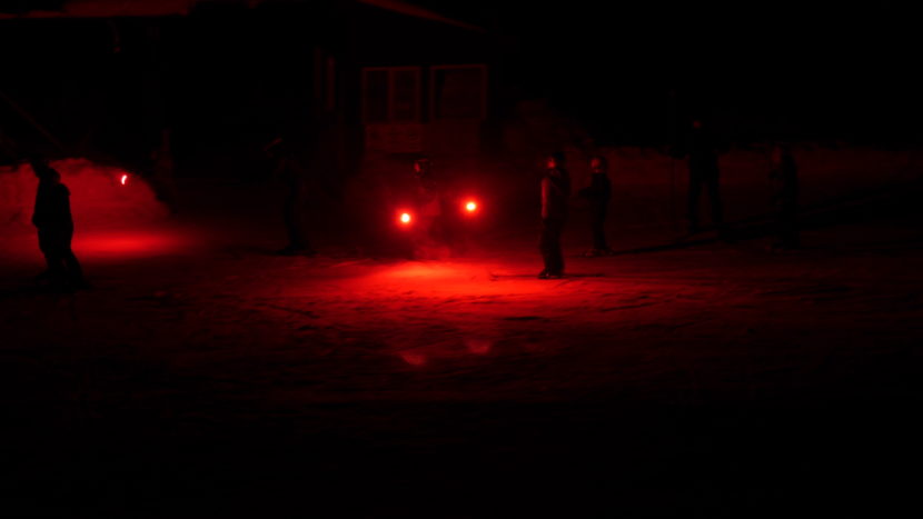 Several skiers after they finished the torchlight parade.