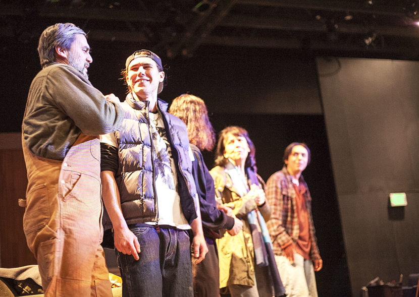Jake Waid, left, and Skyler Ray-Benson Davis talk briefly during a technical rehearsal Tuesday, January 24, 2017, for "They Don't Talk Back," at the Perseverance Theatre, Douglas, Alaska. (Photo by Tripp J Crouse/KTOO)