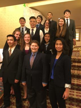 The 13 Juneau-Douglas High School students who competed in the 2017 Alaska Academic Decathlon, Tasha Elizarde, bottom right.