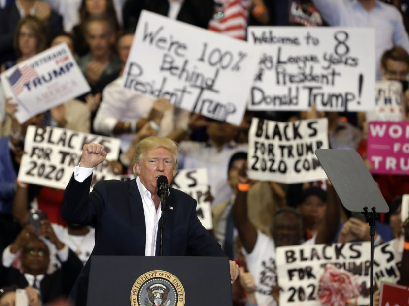 President Donald Trump pumps his fist to supporters at the conclusion of a campaign rally Saturday in Melbourne, Fla.