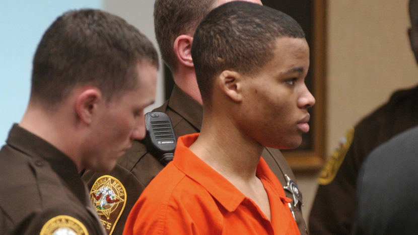 Lee Boyd Malvo attends court proceedings for fellow sniper suspect John Allen Muhammad in 2003. A federal judge has thrown out two sentences of life without parole that Malvo has been serving in Virginia.
