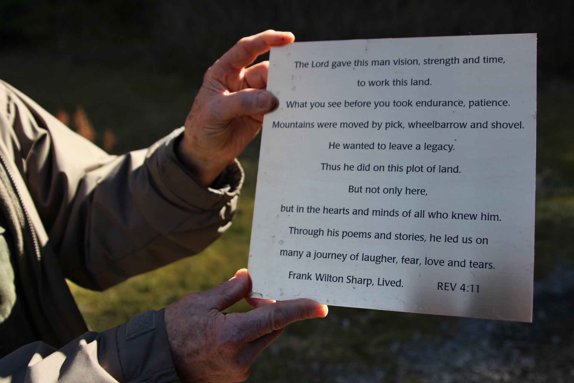 The gold plaque will be placed on a 400 pound rock Frank Sharp moved up outside of his home in Angoon. (Photo by Emily Russell/KCAW)
