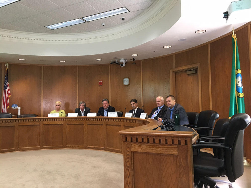 House budget chair Timm Ormsby, second from left, and Senate budget chair John Braun, on right, say they are working to get a budget deal by June 30 to avoid a government shutdown. (Photo by Austin Jenkins/Northwest News Network)