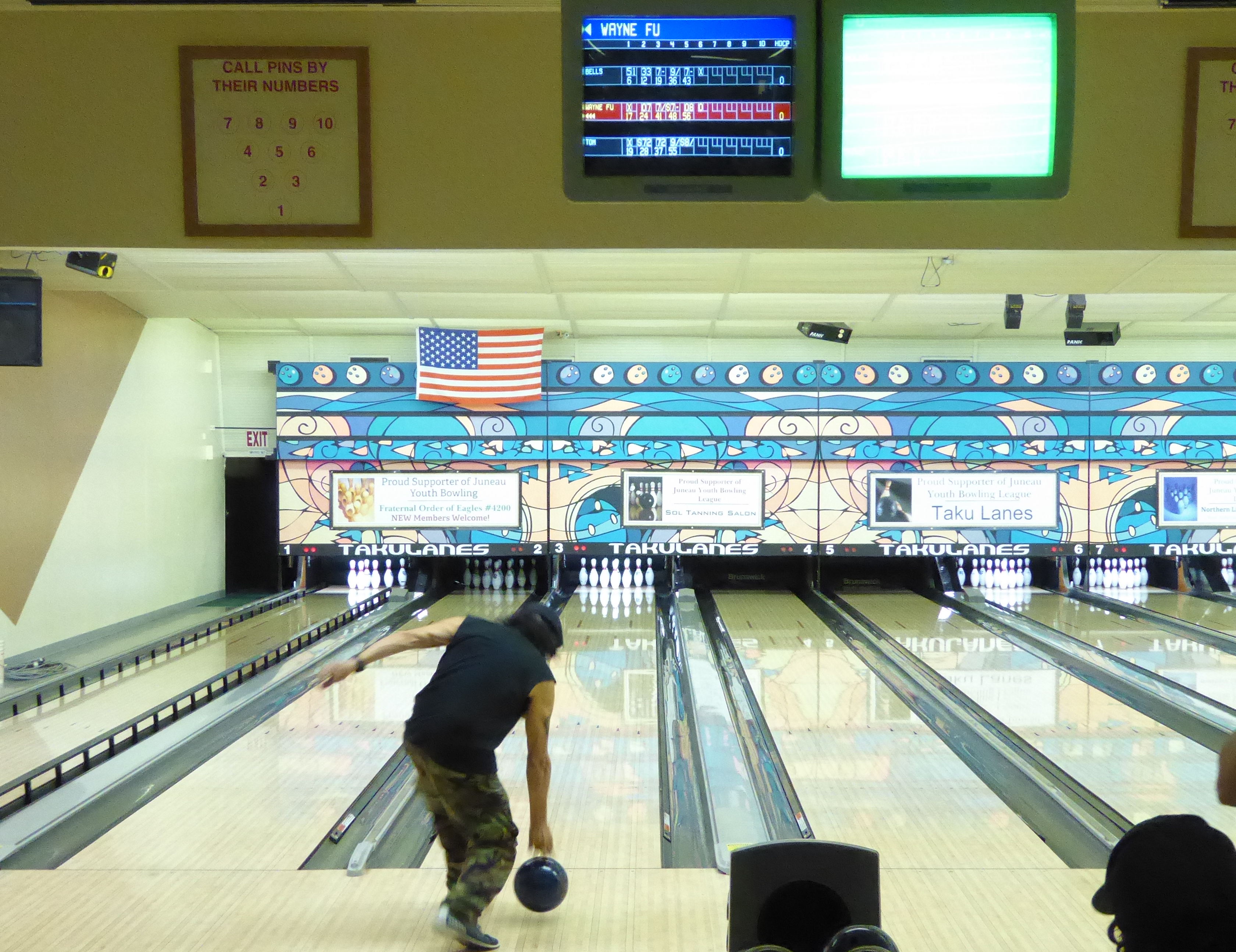 Wayne Fu Smallwood bowls at Taku Lane LLC on Saturday.