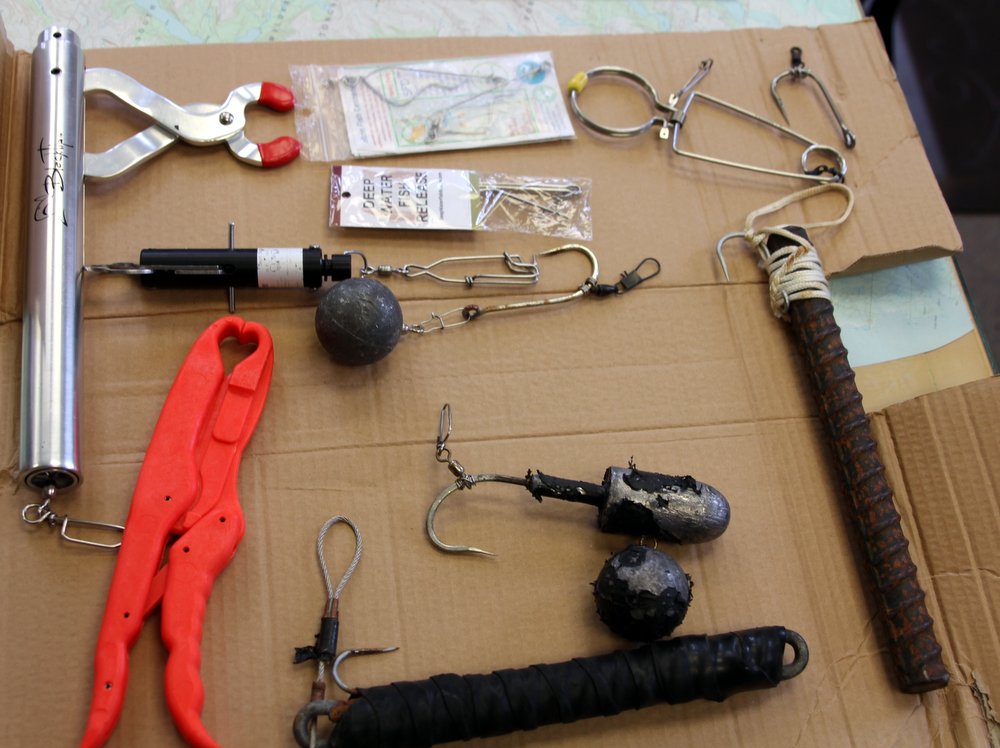 Take your pick: Whether homemade or a commercial design, every sport fishing boat in Southeast Alaska must have a deep-release mechanism on board beginning August 1. (Photo by Robert Woolsey/KCAW)