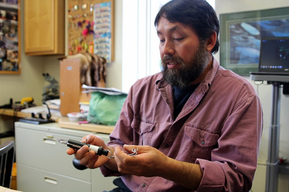 Biologist Troy Tydingco says rockfish can survive barotrauma if they’re promptly released at depth. “Get them back down quickly,” he says. (Photo by Robert Woolsey/KCAW)