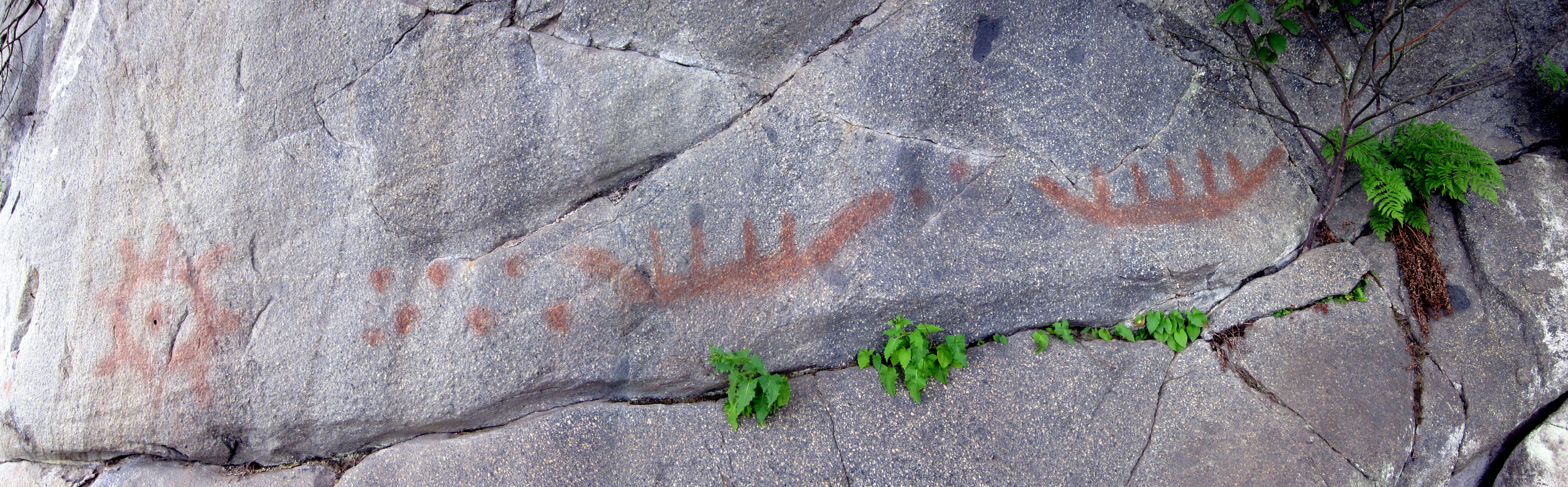 This pictograph of canoes and sun is located near Petersburg. The exact location is kept secret for fear of public vandalism. (Photo courtesy of U.S. Forest Service)