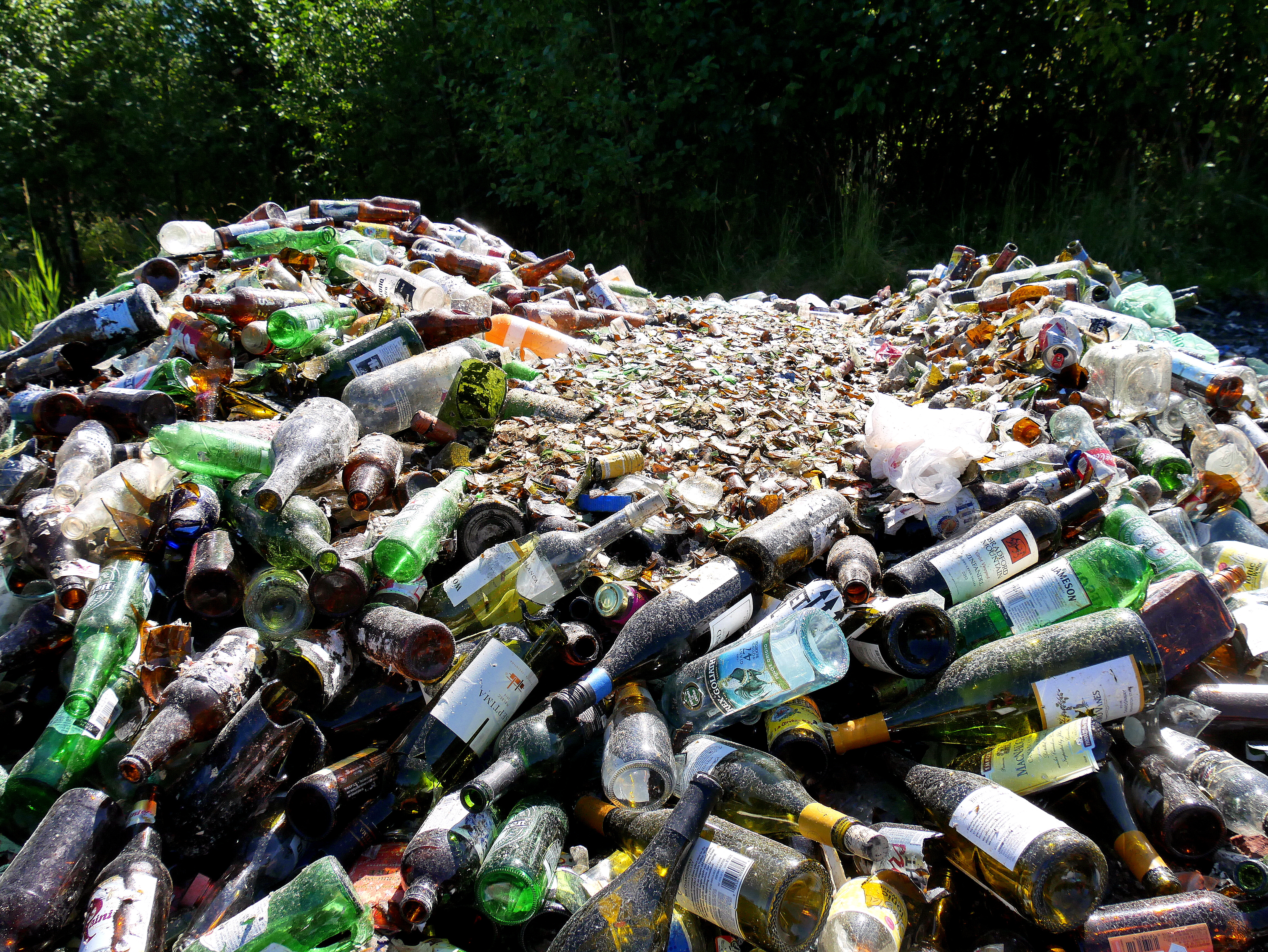 A pile of glass at the Petersburg landfill gets crushed and used in layers to build a road. (Photo by Angela Denning/KFSK)