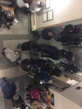 Unalaska residents gather in City Hall during a tsunami warning early on Jan. 23, 2018. (Photo by Zoe Sobel / KUCB)
