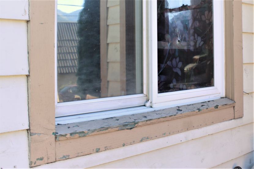 A window at 401 Harris St. in Juneau sports a bullet hole on Oct. 1, 2018. It was from a 2016 drive-by shooting.