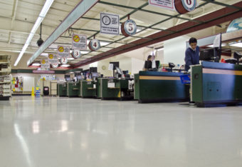 Two checkers ring up orders for customers at A&P on Aug. 31