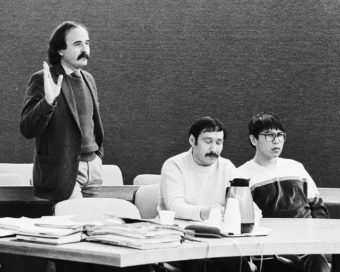Defense attorney Ray Brown (left) addresses the court as Emmanuel Telles (center) and Newton Lambert (right) listen during a pre-trial hearing in the Benolken murder case. (Photo by Brian Wallace.)