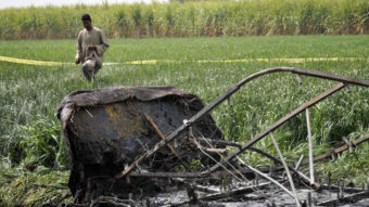 The wreckage of a hot air balloon and its gondola lay in a field near Luxor, Egypt, on Tuesday. A fire and subsequent crash killed many of those who were aboard the tourist flight. Reuters /Landov