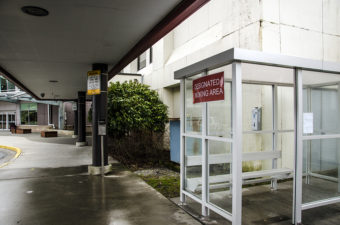 The airport has installed two smoking areas farther from the entrances.