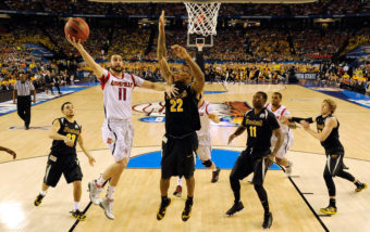 Luke Hancock, No. 11 of the Louisville Cardinals, drives for a shot attempt in the second half of the Final Four semifinal game against Wichita State Saturday. Getty Images