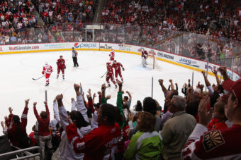 Fans cheer after Martin Hanzal of the Phoenix Coyotes scores an empty-net goal against the Detroit Red Wings in Glendale, Ariz., on April 4. Christian Petersen/Getty Images