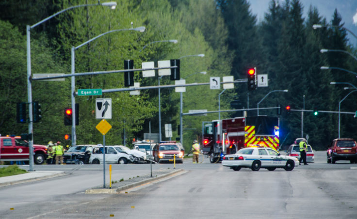 A 1994 white Nissan van struck a black 2010 Chevy truck at 4:37 a.m. Three people were taken to the hopsital.