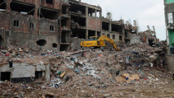 Bangladeshi rescue and army personnel on Wednesday continue recovery operations at the site of the building collapse near Dhaka. Munir Uz Zaman/AFP/Getty Images