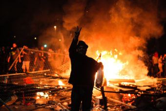 Protesters clash with riot police between Taksim and Besiktas in Istanbul, on Sunday. Gurcan Ozturk/AFP/Getty Images