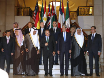 Secretary of State John Kerry (front row, third from right) poses with foreign ministers of the "Friends of Syria" in Doha, Qatar. AFP/AFP/Getty Images