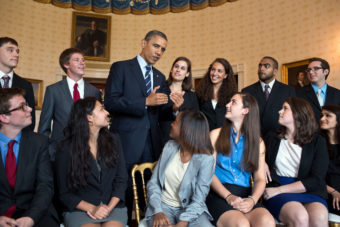 President Barack Obama greets students in the Blue Room of the White House before delivering a statement on college affordability and interest rates on student loans, June 21, 2012. (Official White House Photo by Pete Souza)