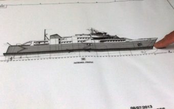 ACF Day Boat DOT Project Manager Doug Miller points to the bow of the proposed ferry, where vehicles would load or unload.