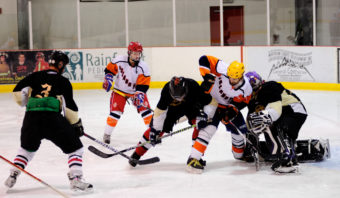 Traffic in front of the net was a common occurrence in Sunday’s Tier A game between Island Pub and the Viking. Island Pub kicked off opening day for JAHA with a 5-2 victory.