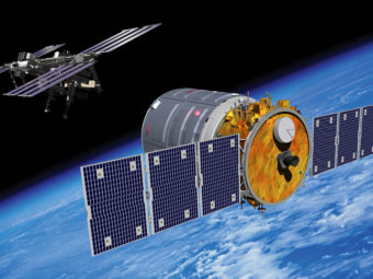 An artist's rendering of the Cygnus spacecraft approaching the International Space Station. Orbital Sciences