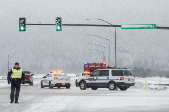 Police blocked the right lane of traffic at the intersection of Egan Drive and Vanderbilt Hill Road. (Photo by Sarah Yu/KTOO)