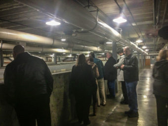 Wal-Mart executives tour DIPAC on January 8, 2014. (Alexandra Gutierrez/APRN)