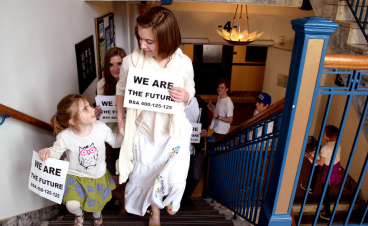 A pack of 18 youths walked the halls of the State Capitol, April 16, 2014, in a silent demonstration asking for more education funding. Bridget Galvin, a junior at Steller Secondary School in Anchorage and founder of Students With a Voice organized the event. (Skip Gray/Gavel Alaska)