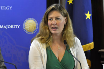 Rep. Lindsey Holmes speaks to reporters during a House Majority press availability, Feb. 27, 2014. (Photo by Skip Gray/Gavel Alaska)