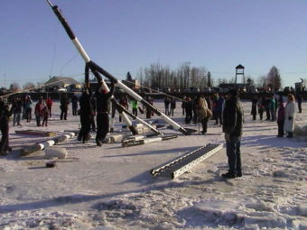 Raising the 2014 tripod. (Photo courtesy Nenana Ice Classic website)