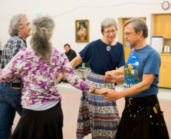 A group of people dancing.