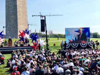 David Rubenstein on the Jumbotron at the Washington Monument Monday. (Photo by Liz Ruskin/APRN)