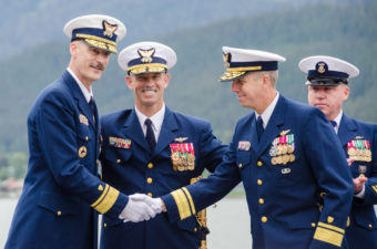 A salute and a handshake conclude the transfer of command. (Photo by Heather Bryant/KTOO)