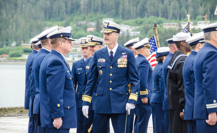 Rear Adm. Tom Ostebo inspects the District 17 crew with Rear Adm. Dan Abel. (Photo by Heather Bryant/KTOO)