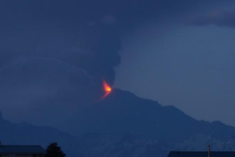 Pavlof in eruption, with lava fountaining and ash plume, in the early hours of June 4, 2014 as seen from Cold Bay. (Photo courtesy AVO/Robert Stacy)