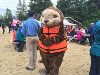 The PFD Otter teaches boat safety at the picnic. (Photo by Sarah Yu/KTOO)