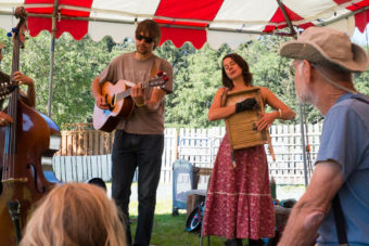 Members of Elephant Revival playing instruments