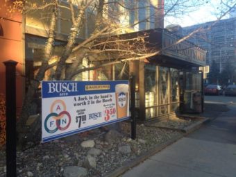 The alcohol ad was in front of McGinley’s Pub and used the AFN logo without permission (Photo by Alexandra Gutierrez/APRN)