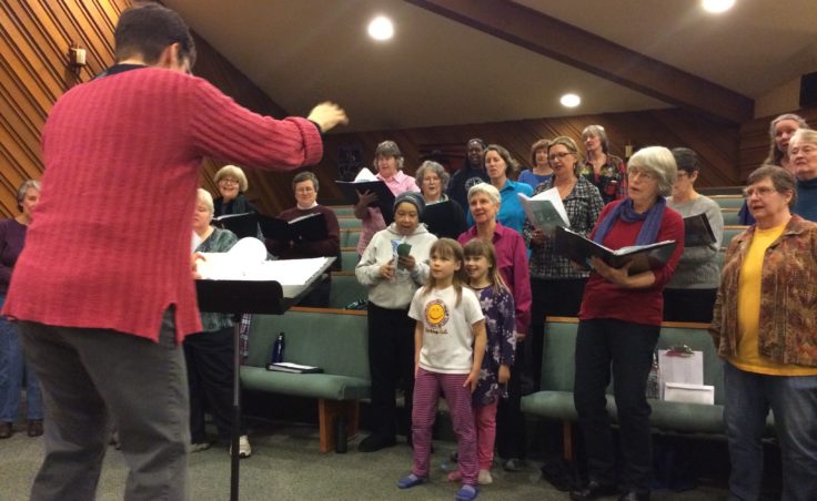 The Juneau Pride Chorus rehearsing on Tuesday at Resurrection Lutheran Church. (Photo by Scott Burton/KTOO)
