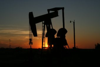 A pump jack at sunset.