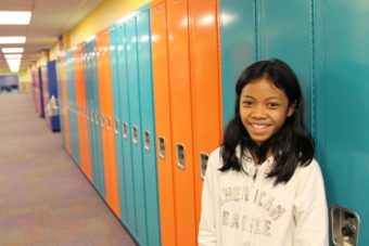 At 12, Jasmine Molina has found a way to help newly arriving Filipino students transition to middle school. “She is a self-initiated ambassador,” says her teacher, Janelle Farvour. (Emily Kwong/KCAW photo)